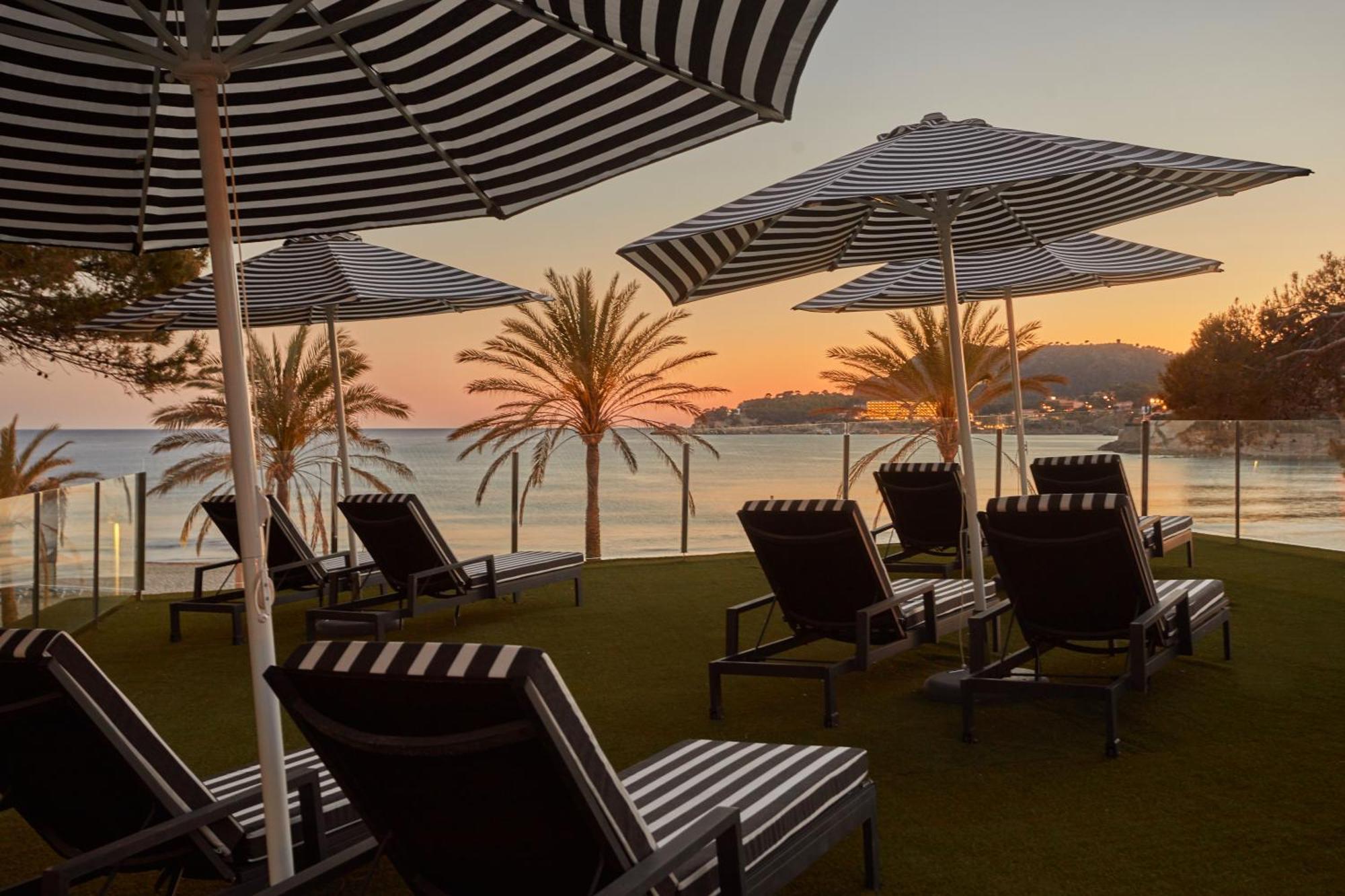Secrets Mallorca Villamil Resort & Spa - Adults Only パゲラ エクステリア 写真 Sunset at the beach
